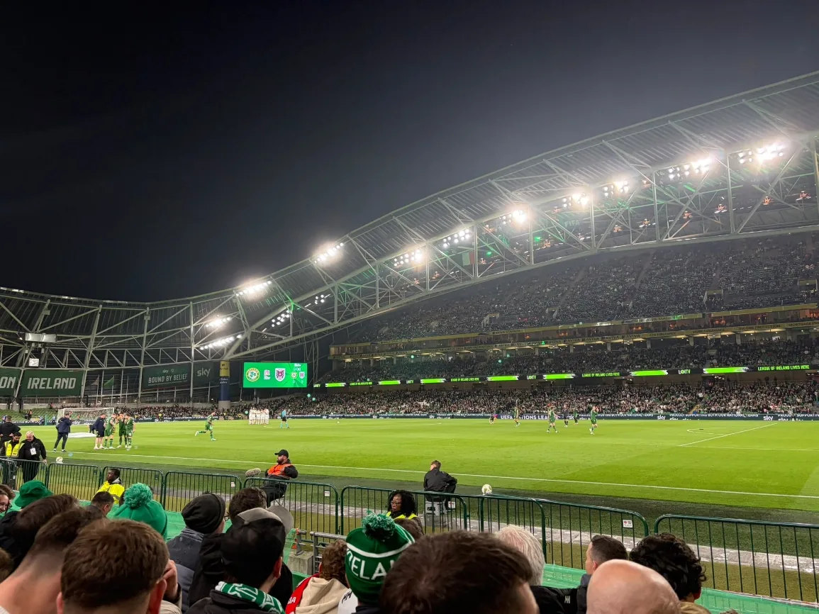Ireland playing under floodlights in Dublin, seen from the stand